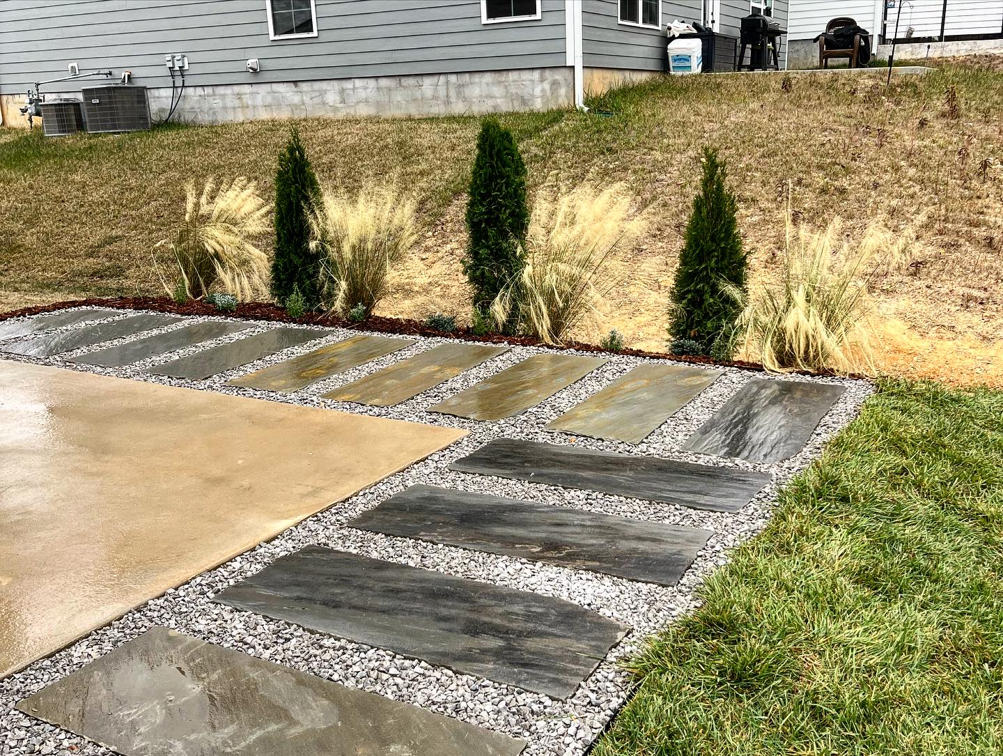 Concrete patio with flagstone edge